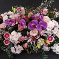 img Raquette camaïeu rose avec Orchidée - fleuriste Blaye